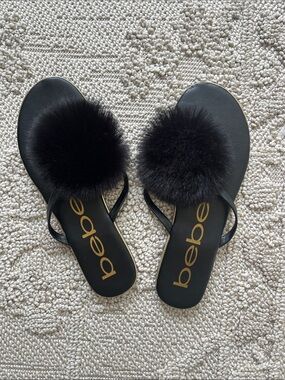 bebe Black Pom-Pom Slide Sandals with Gold Logo